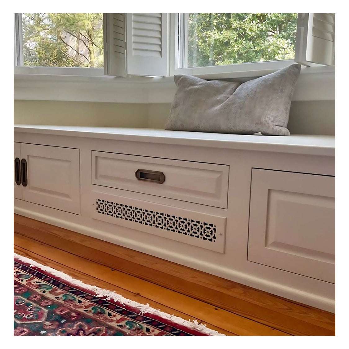 Achtek 3x24 powder coated white air return vent shown installed on cabinet

